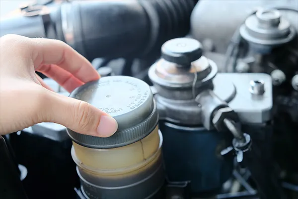 brake fluid being checked